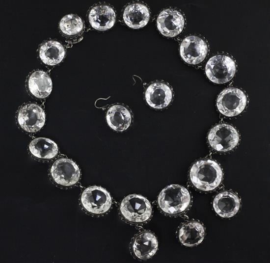 A mid to late 19th century white metal and rock crystal drop necklace and pair of matching earrings, 40cm.